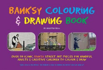 Banksy Colouring a Drawing Book