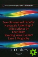 Two-Dimensional Periodic Nanoscale Patterning of Solid Surfaces by Four-Beam Standing Wave Excimer Laser Lithography
